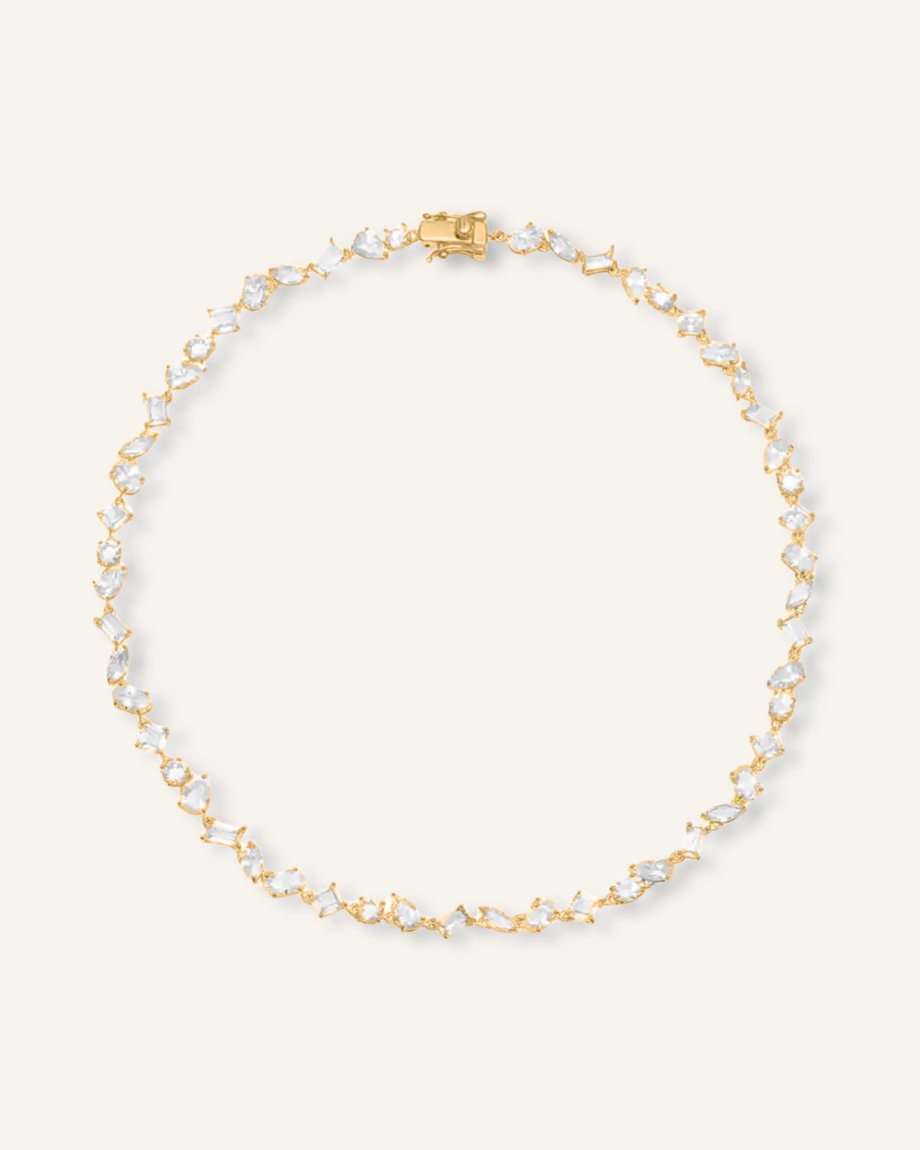 Carina Necklace featuring gold coating and various cut zirconia stones.