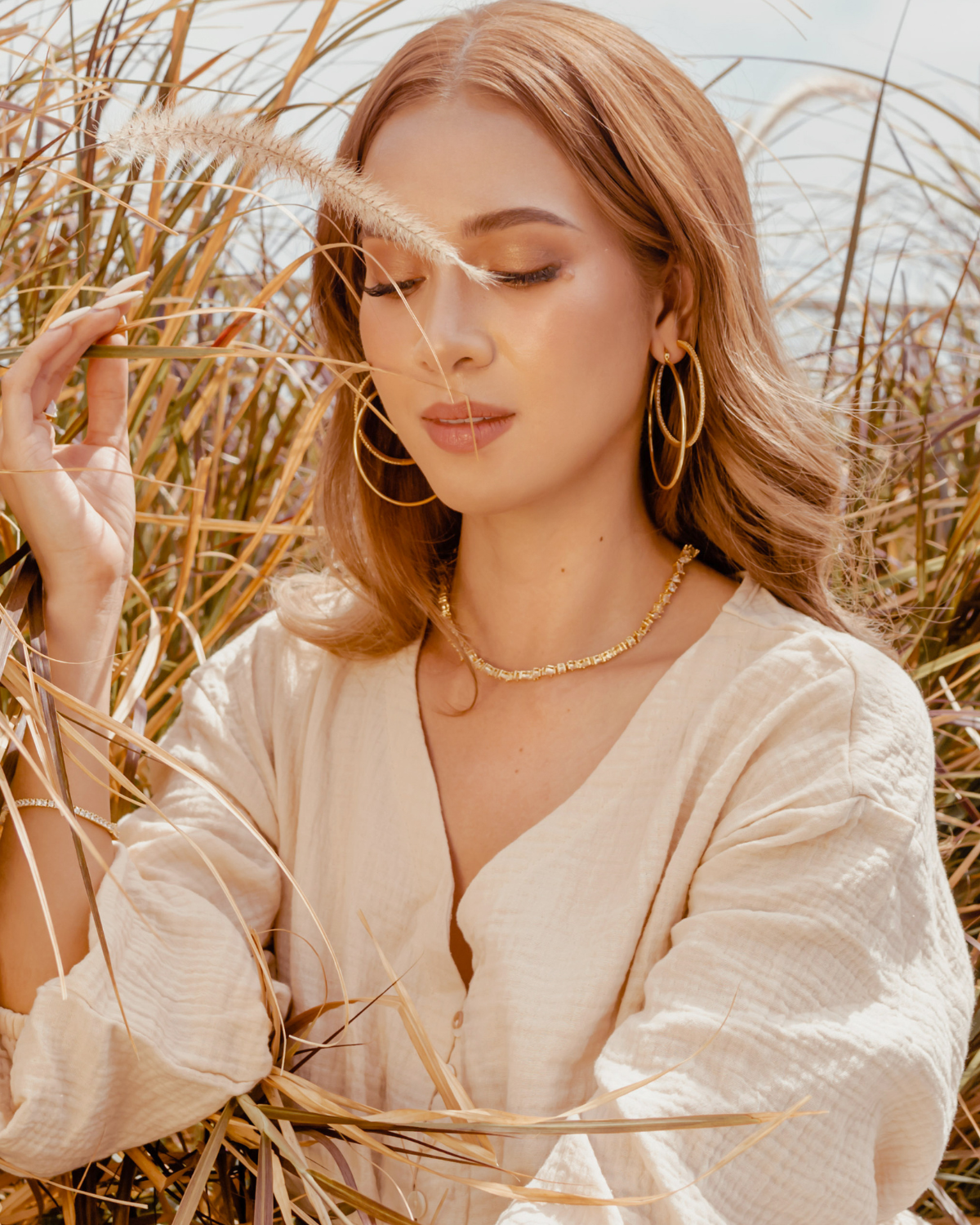 Front profile view of Carina Necklace sparkling in natural light.