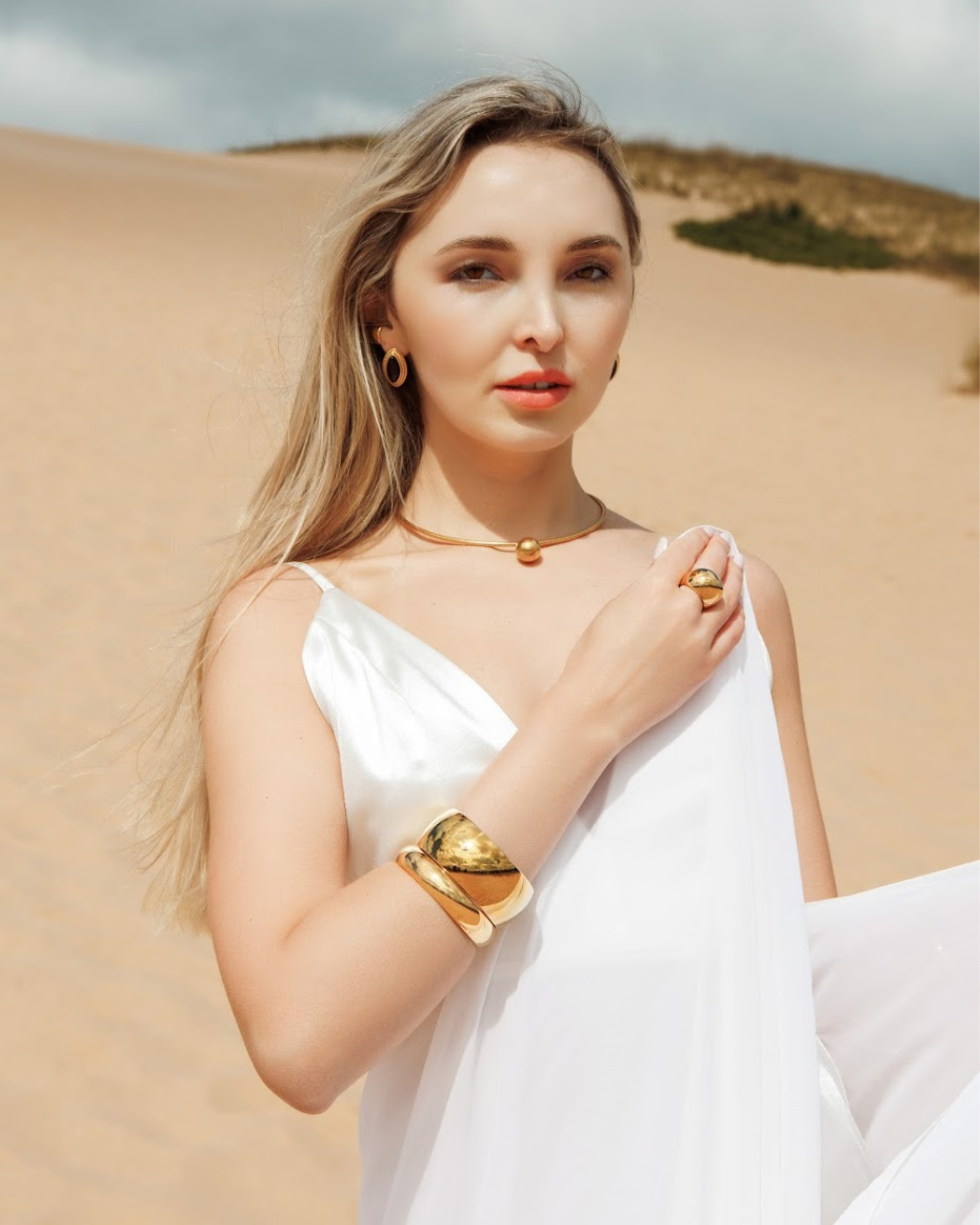 Gold Casie Choker Necklace styled with a minimalist outfit for a modern look.
