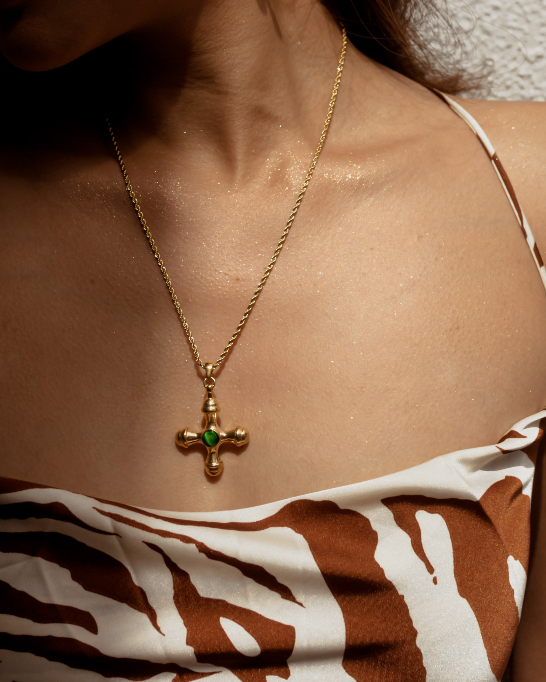 Model closeup wearing Chiara Necklace with green agate pendant.