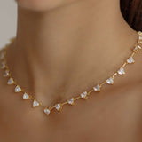 Closeup of the Heart Necklace worn, highlighting the sparkling heart stones.