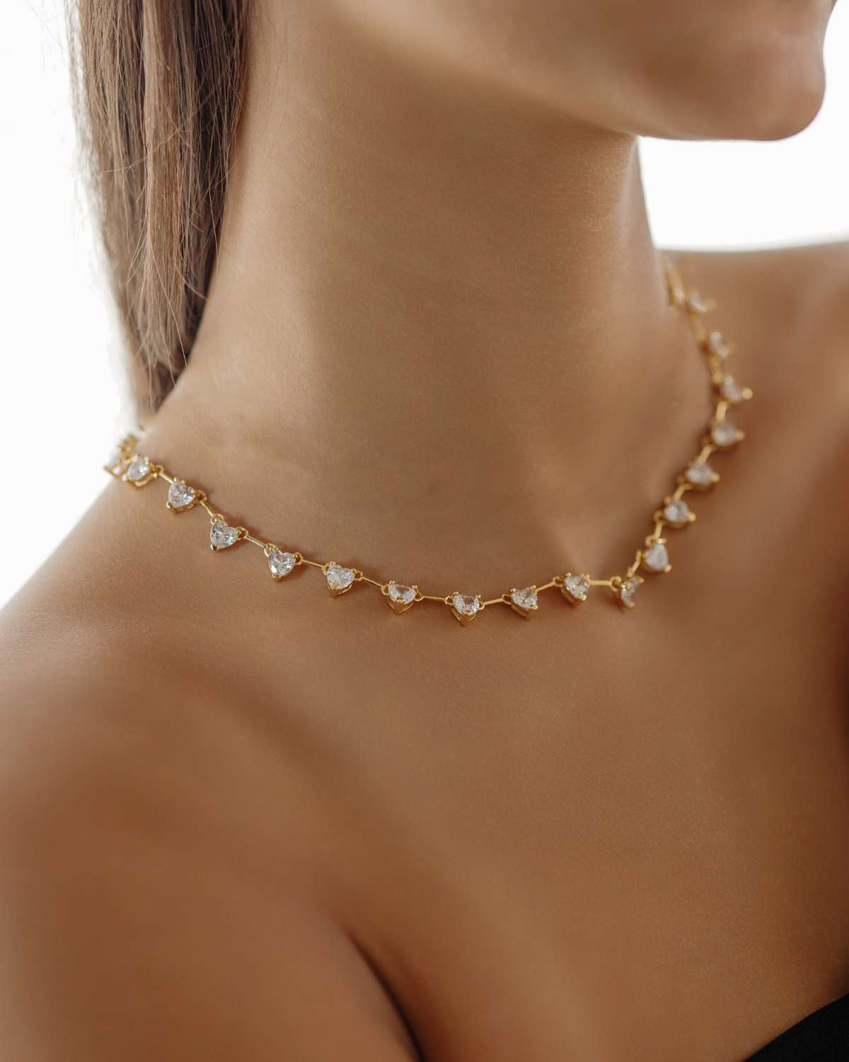Heart Necklace styled as a statement piece for an elegant outfit.