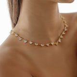 Heart Necklace styled as a statement piece for an elegant outfit.