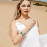 Kali Silver Cuff on model’s wrist, styled with a neutral-toned outfit.