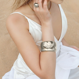 Kali Silver Cuff styled with other bangles for a layered, fashionable look.