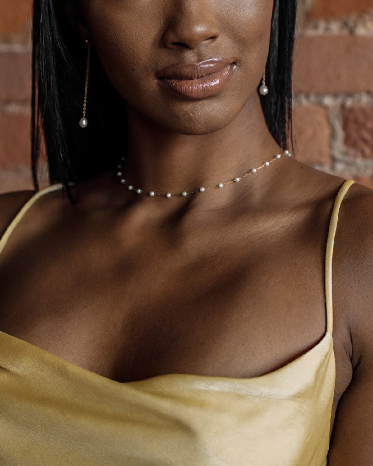 Front view of Layla Necklace styled with daily wear, showing symmetrical pearl placements.