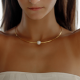 Close-up of Loreli Choker worn on neck, highlighting the pearl centerpiece.