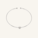 Silver-coated Loreli Choker with central pearl and paperclip chain design, laid flat to highlight details.
