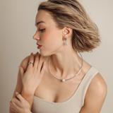 Lifestyle image of model in swimwear wearing Loreli Choker, styled for casual elegance.