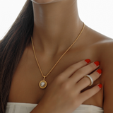 Front view of the Myrcella Necklace worn to showcase length and elegance.