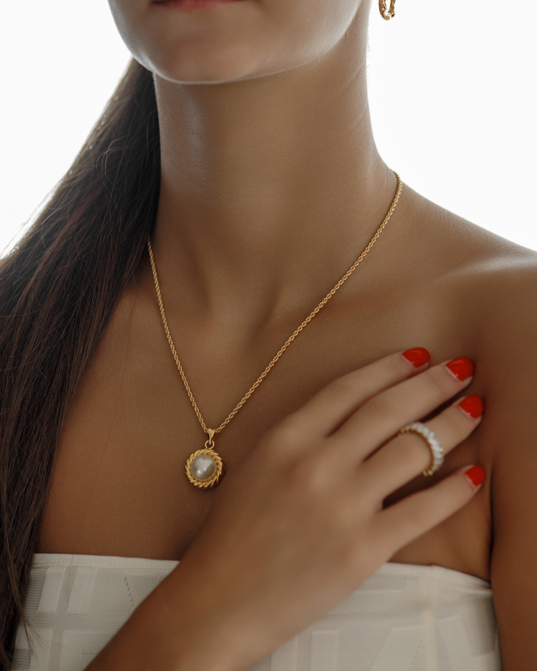 Front view of the Myrcella Necklace worn to showcase length and elegance.