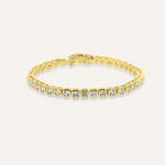 Zara Bracelet flatlay in 18K gold with square zirconia stones and tennis chain style.