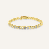 Zara Bracelet flatlay in 18K gold with square zirconia stones and tennis chain style.