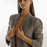 Gold Zara Bracelet styled for a formal or special event look.