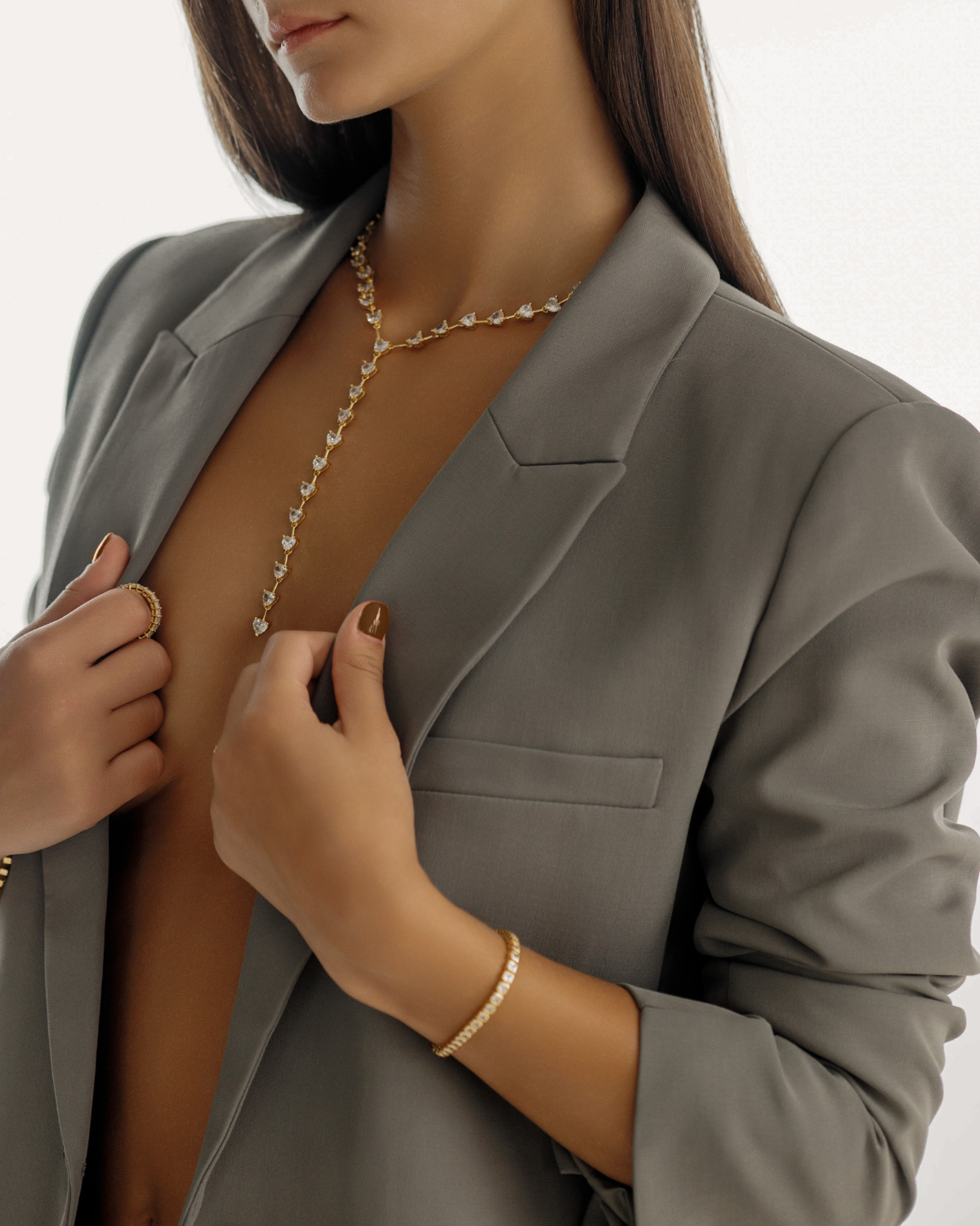 Zara Bracelet stacked with other gold pieces for a bold, modern wrist stack.