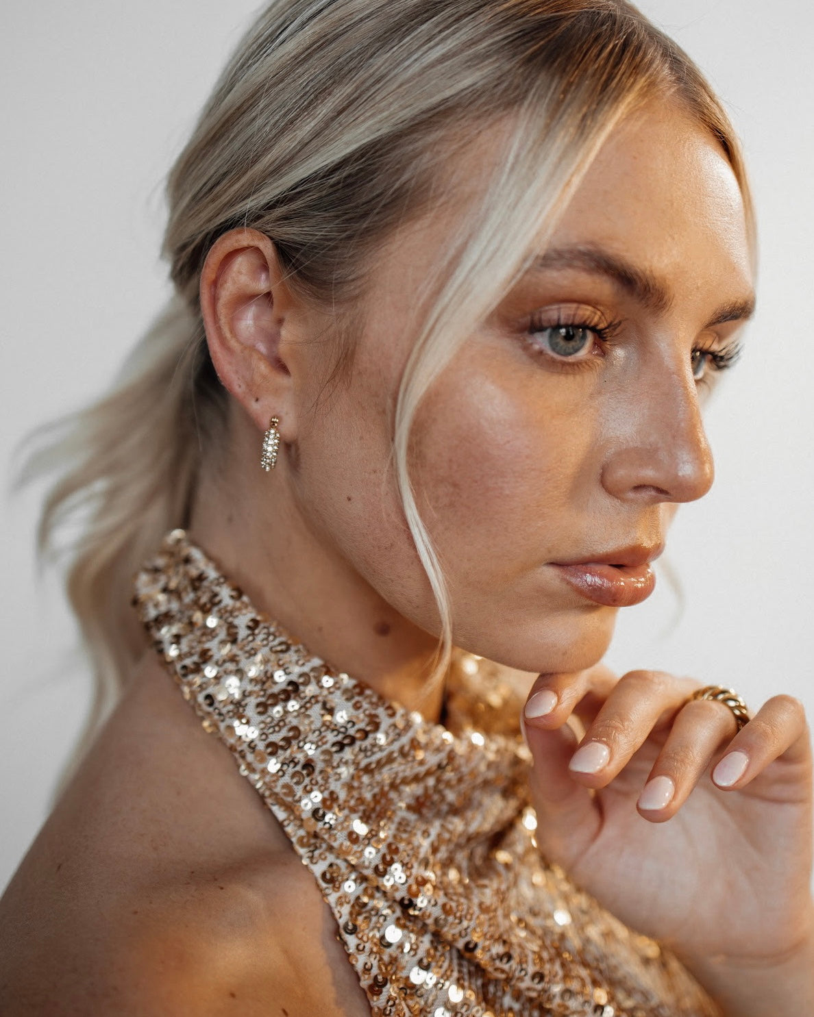 Second side view showing Belle Earrings' hoop design and shine.