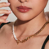 Closeup of Blanche Necklace worn on neck showing toggle closure and mixed materials.