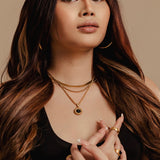 Portrait view of model wearing the Capri Necklace for a bold and stylish statement.