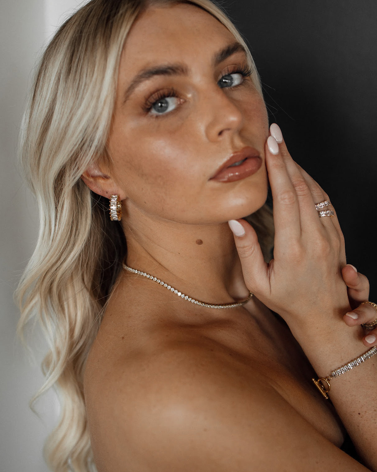 Ciana Earrings styled in everyday outfit, front view angle.