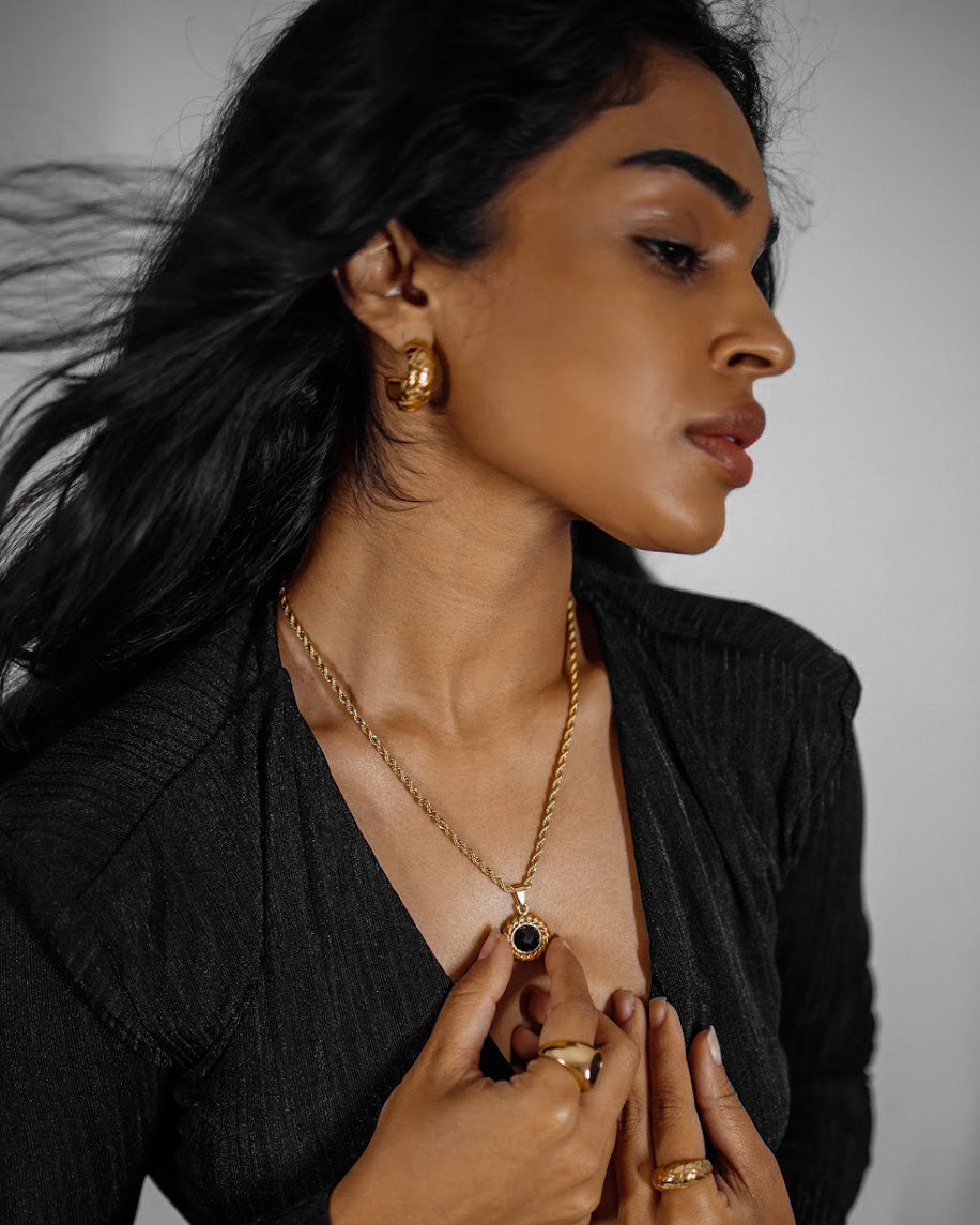 Front view of Gaia Earrings styled for bold yet elegant everyday fashion.