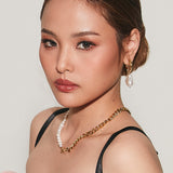 Semi side angle of Maya Earrings showing versatile and elegant design.