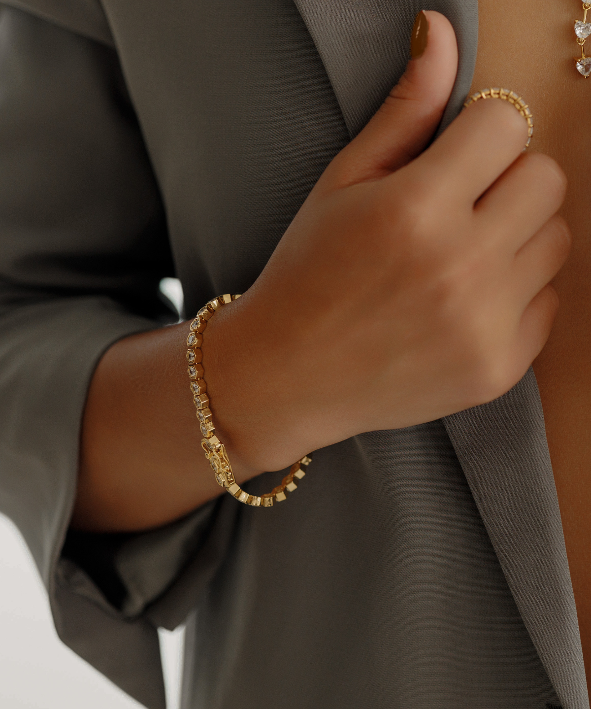 Andra Bracelet worn casually, showcasing octagonal stones in a classic tennis bracelet style.