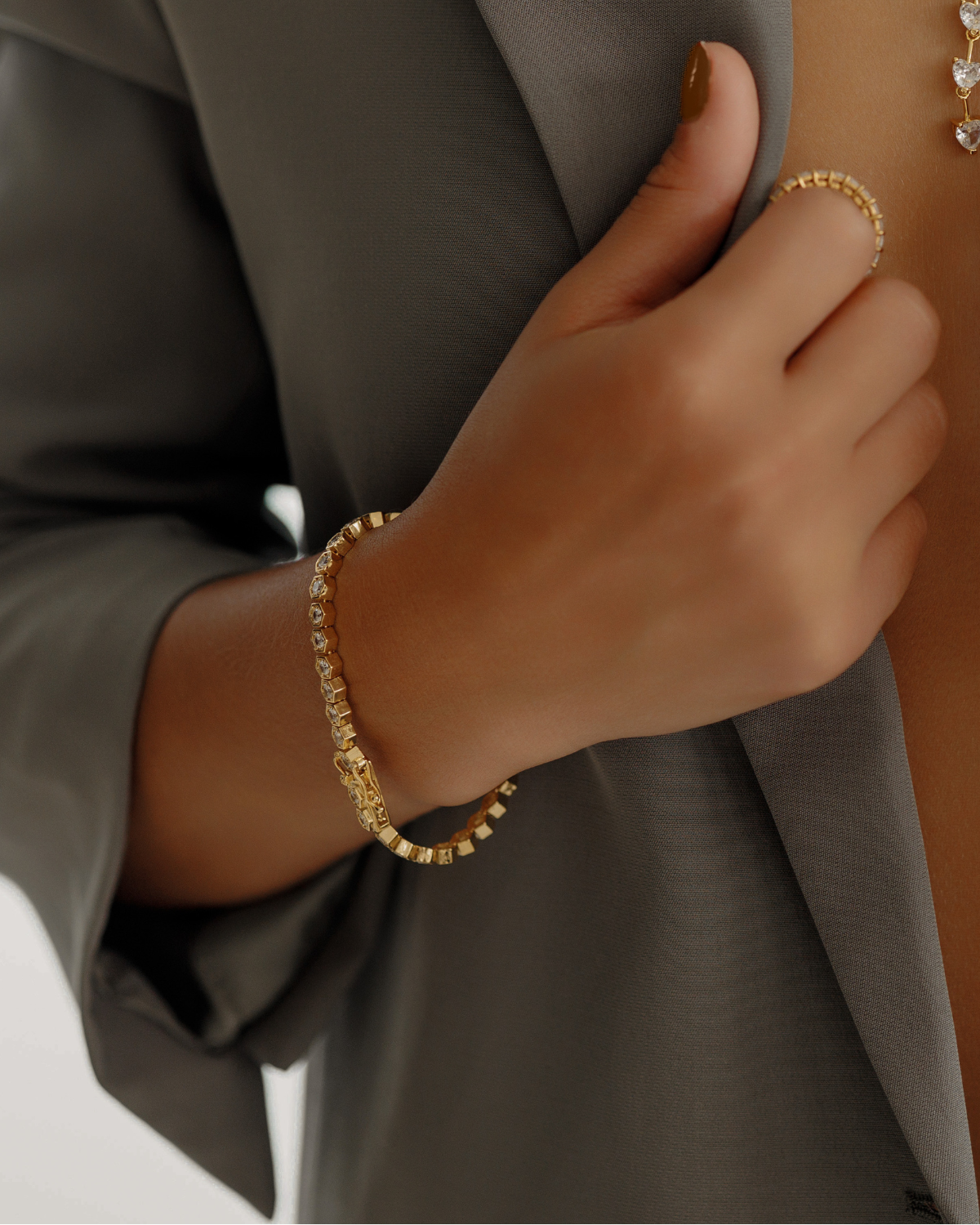 Andra Bracelet worn casually, showcasing octagonal stones in a classic tennis bracelet style.