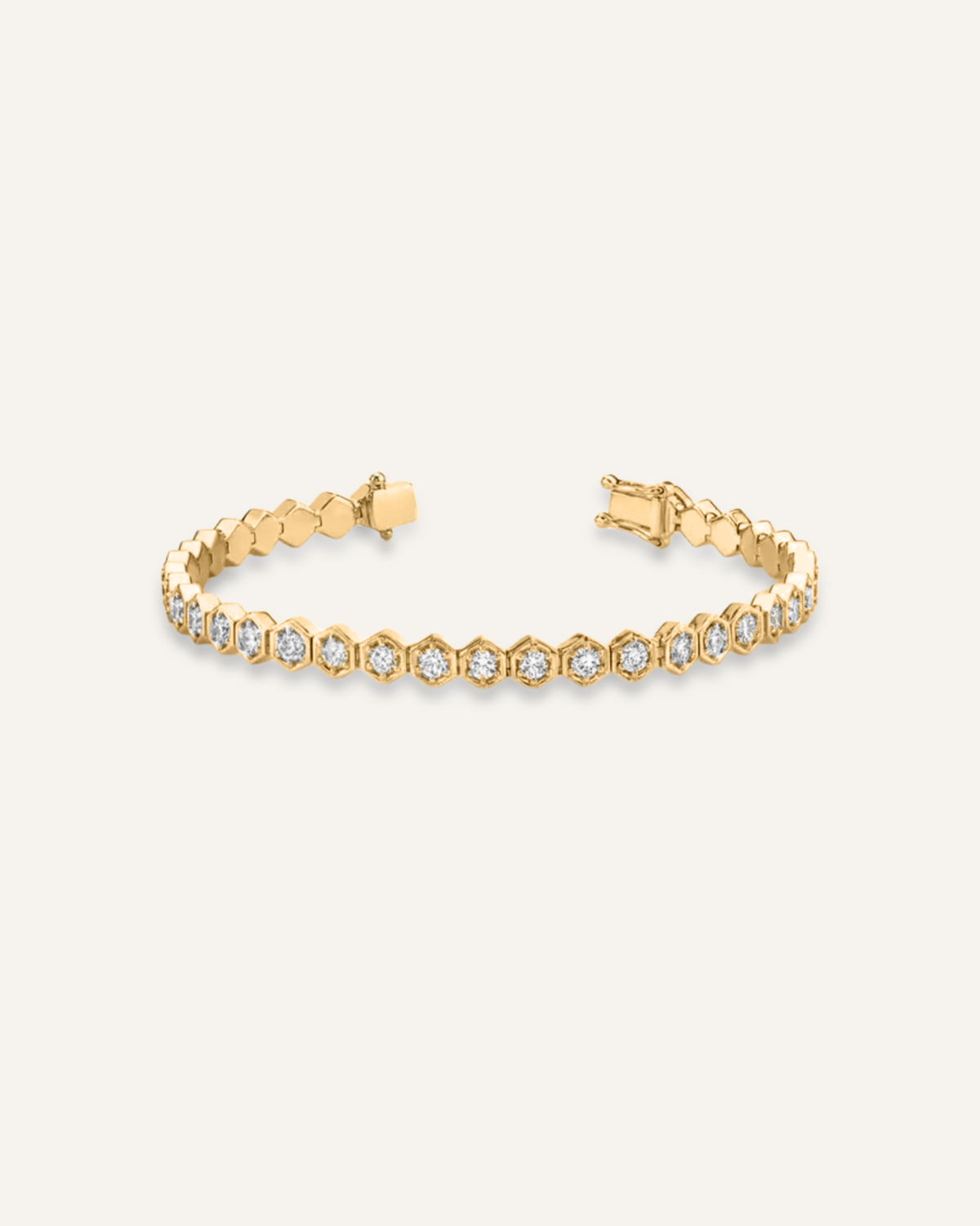 Andra Bracelet flatlay in 18K gold with octagonal zirconia stones and tennis chain design.
