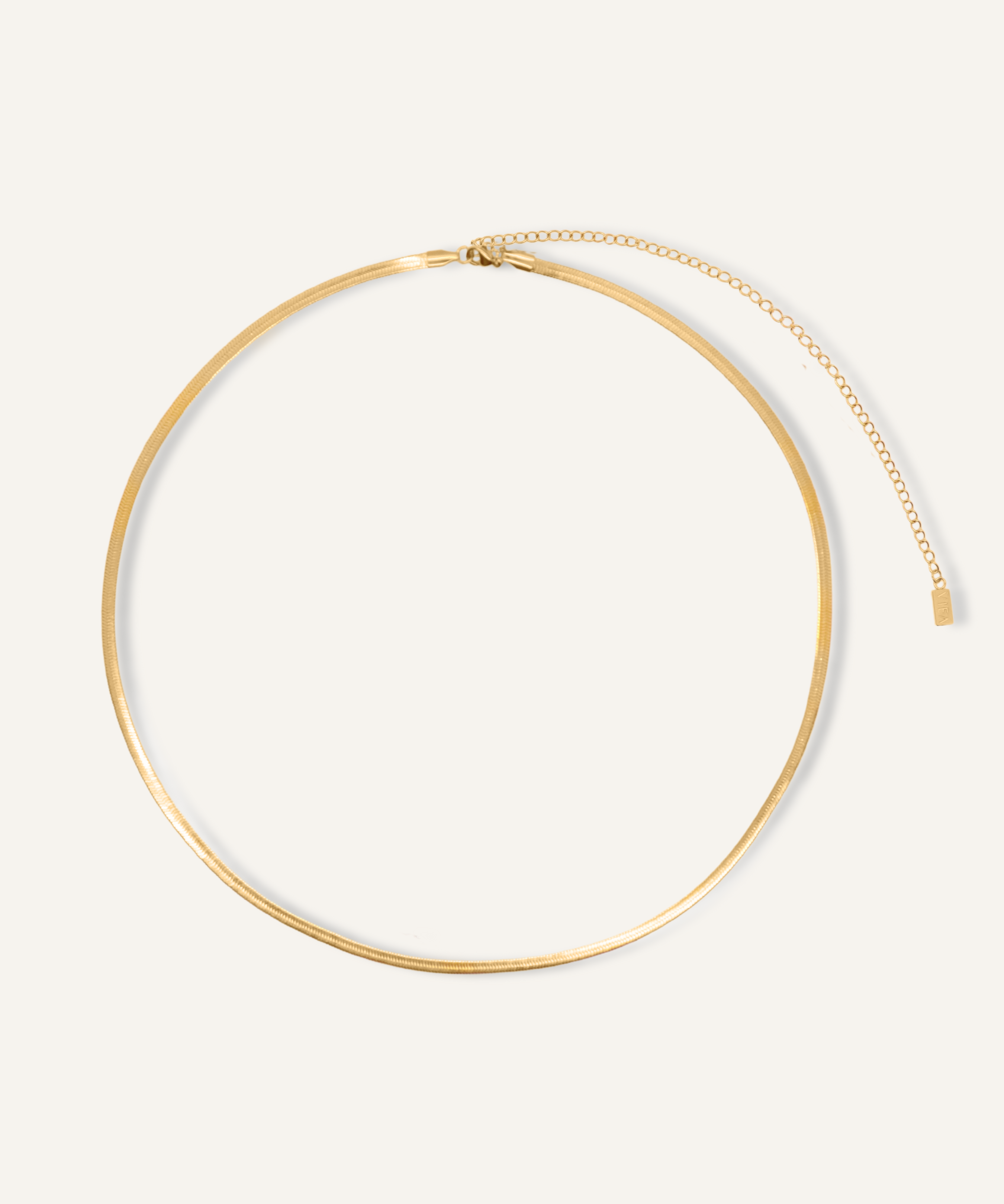 Product image of Antonette Body Chain in gold herringbone design.