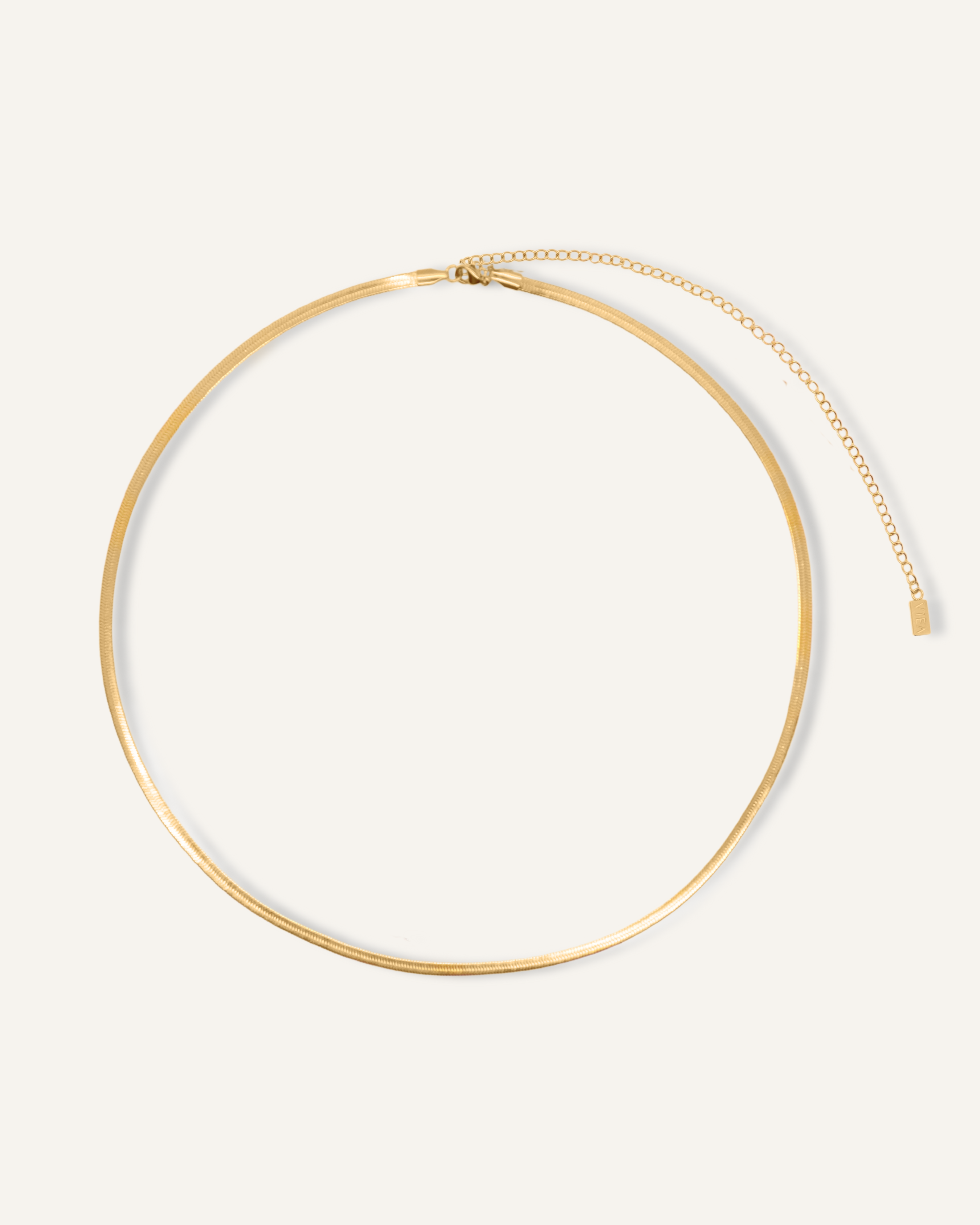 Product image of Antonette Body Chain in gold herringbone design.
