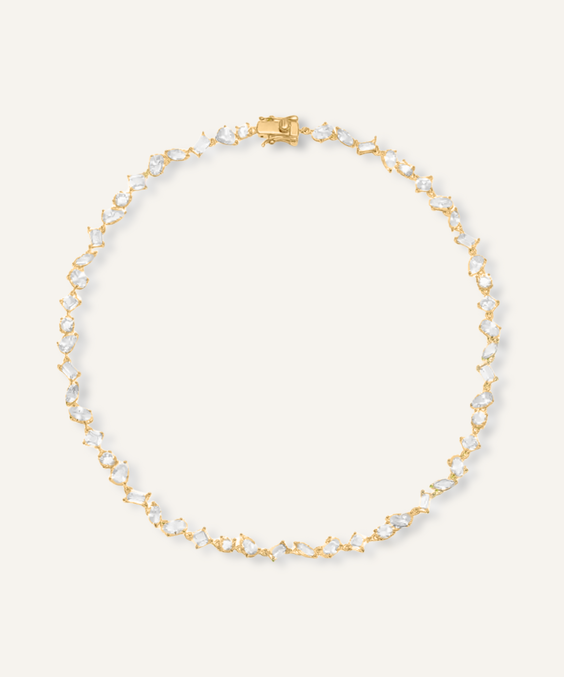 Carina Necklace featuring gold coating and various cut zirconia stones.