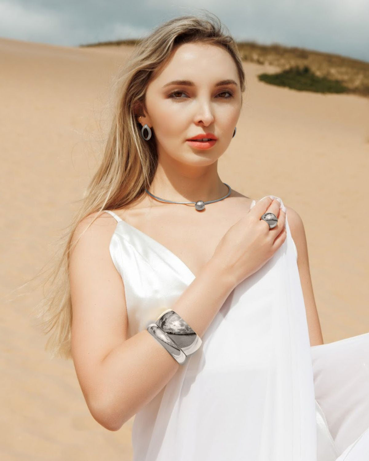 Casie silver dome choker styled with a casual outfit, offering a modern touch.