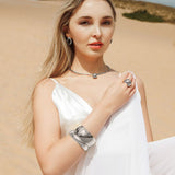 Casie silver dome choker styled with a casual outfit, offering a modern touch.