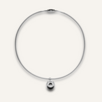 Casie Necklace in silver featuring a round snake chain with a bold circular dome pendant.