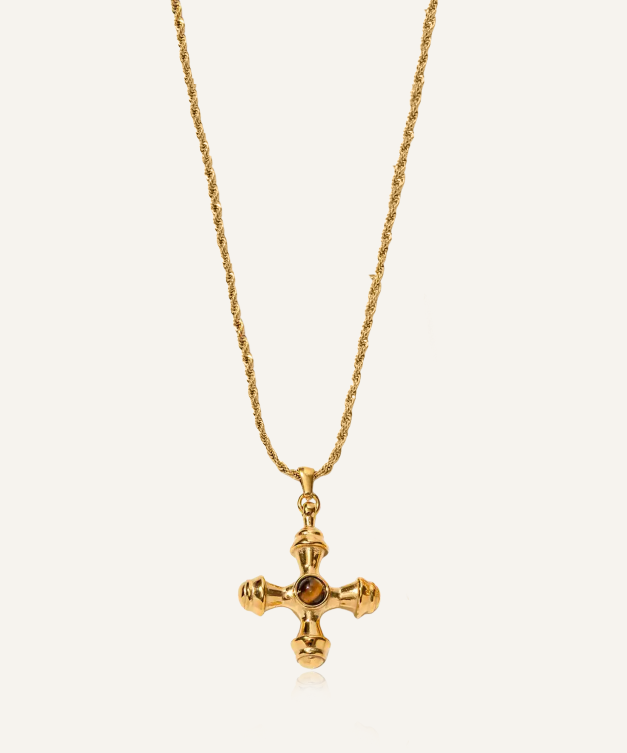 Chiara Necklace with puffed cross pendant and tiger eye stone on gold rope chain.
