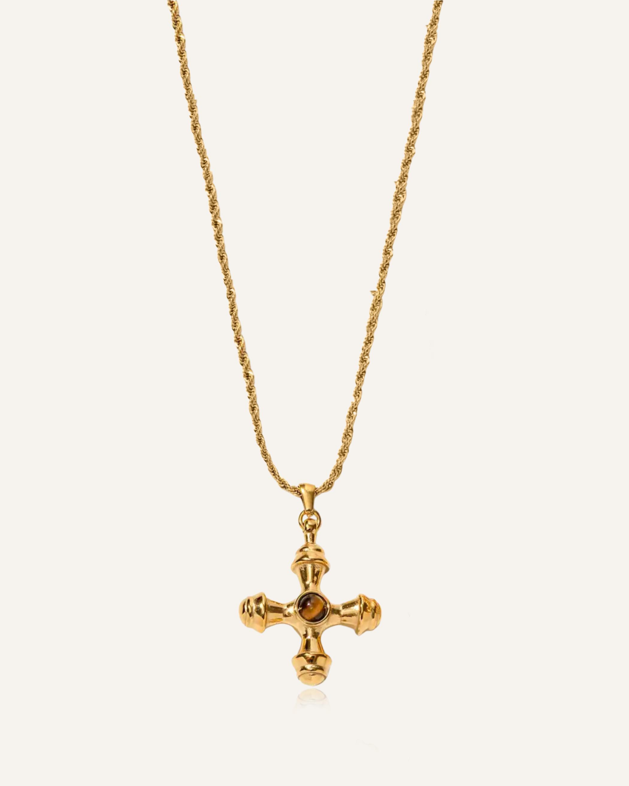 Chiara Necklace with puffed cross pendant and tiger eye stone on gold rope chain.