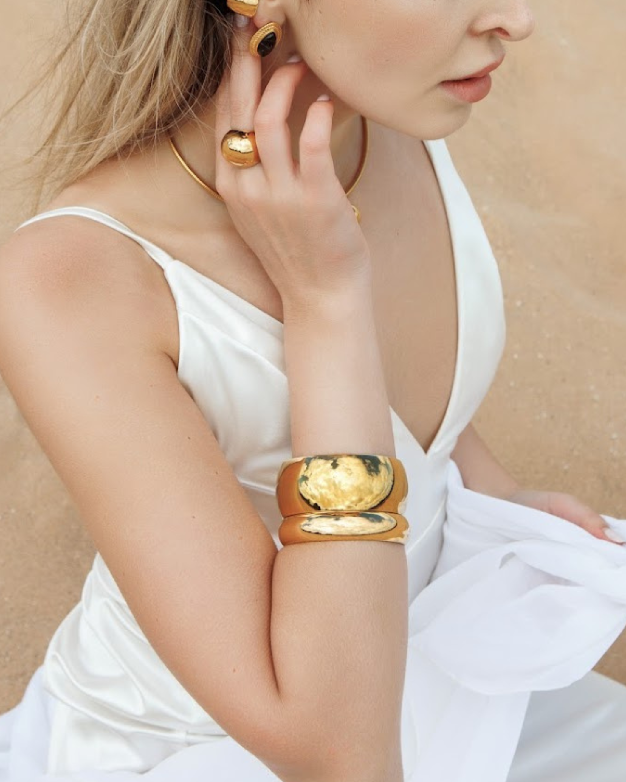 Close-up wrist view of the Dany Gold Cuff worn solo for maximum impact.