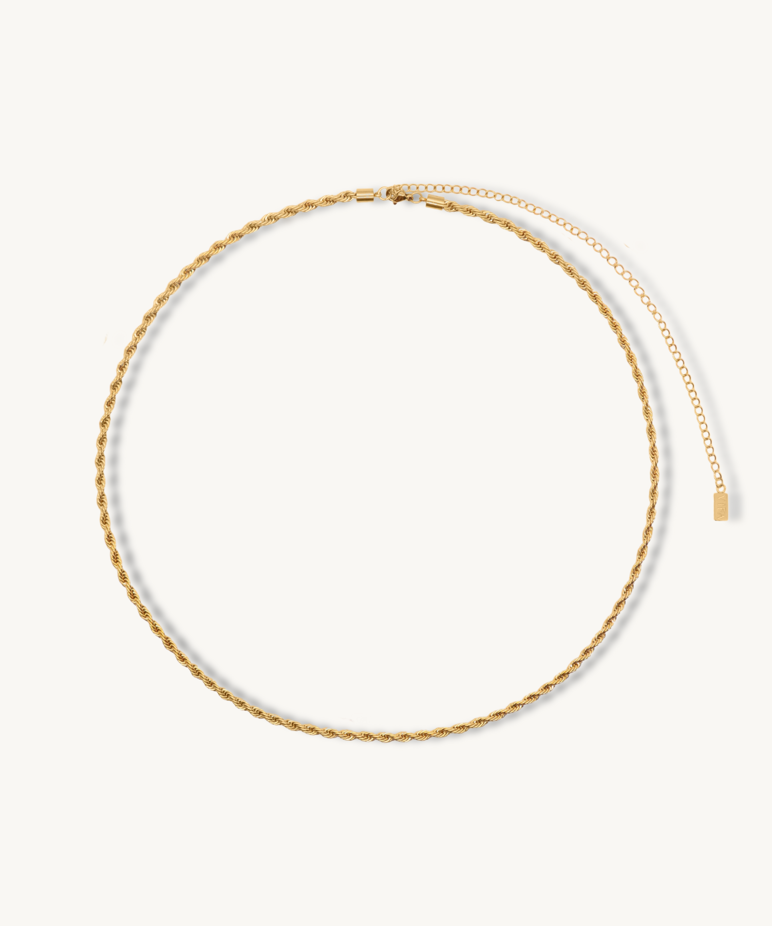 Flatlay image of the Fiona Body Chain showing its 18k gold-coated rope chain.