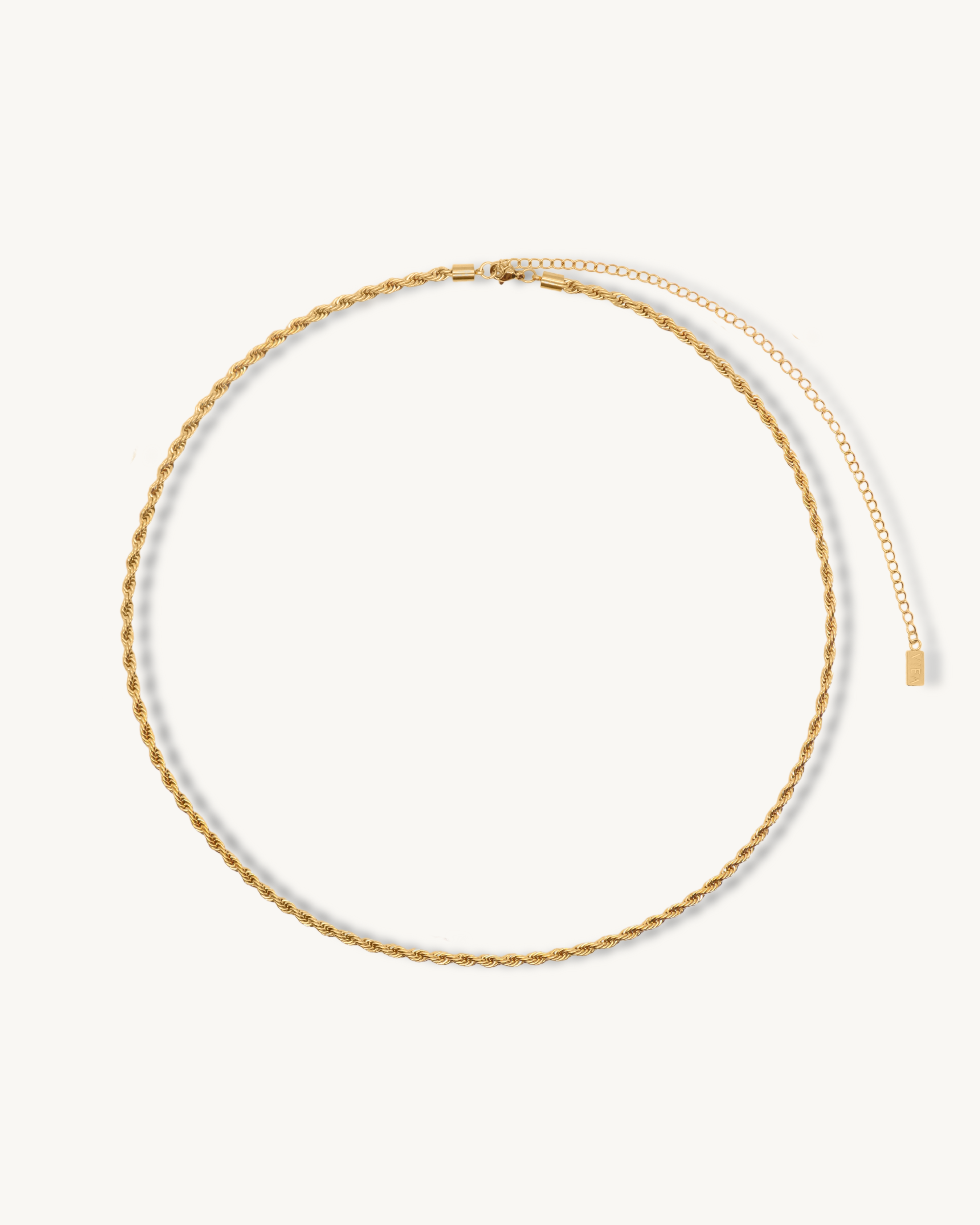 Flatlay image of the Fiona Body Chain showing its 18k gold-coated rope chain.