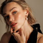 Freya Earrings styled on model with full front view.
