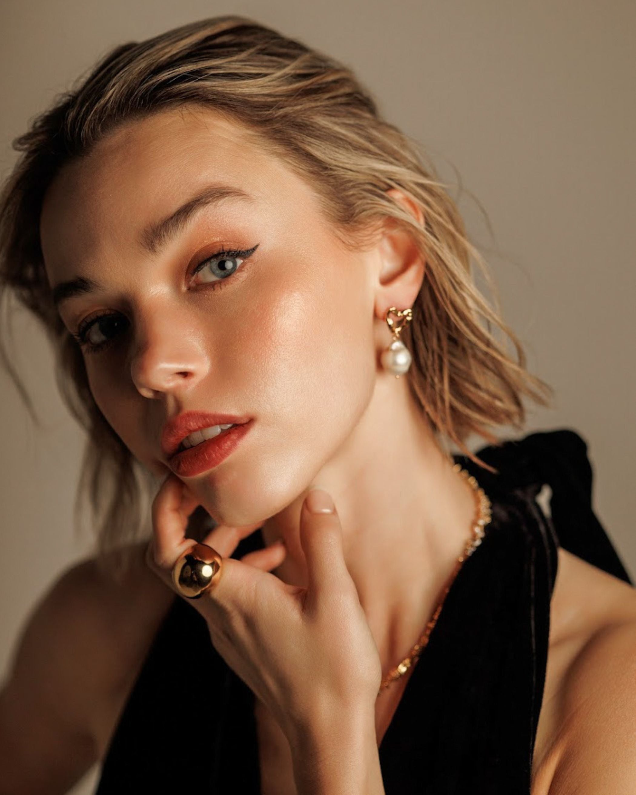 Freya Earrings styled on model with full front view.