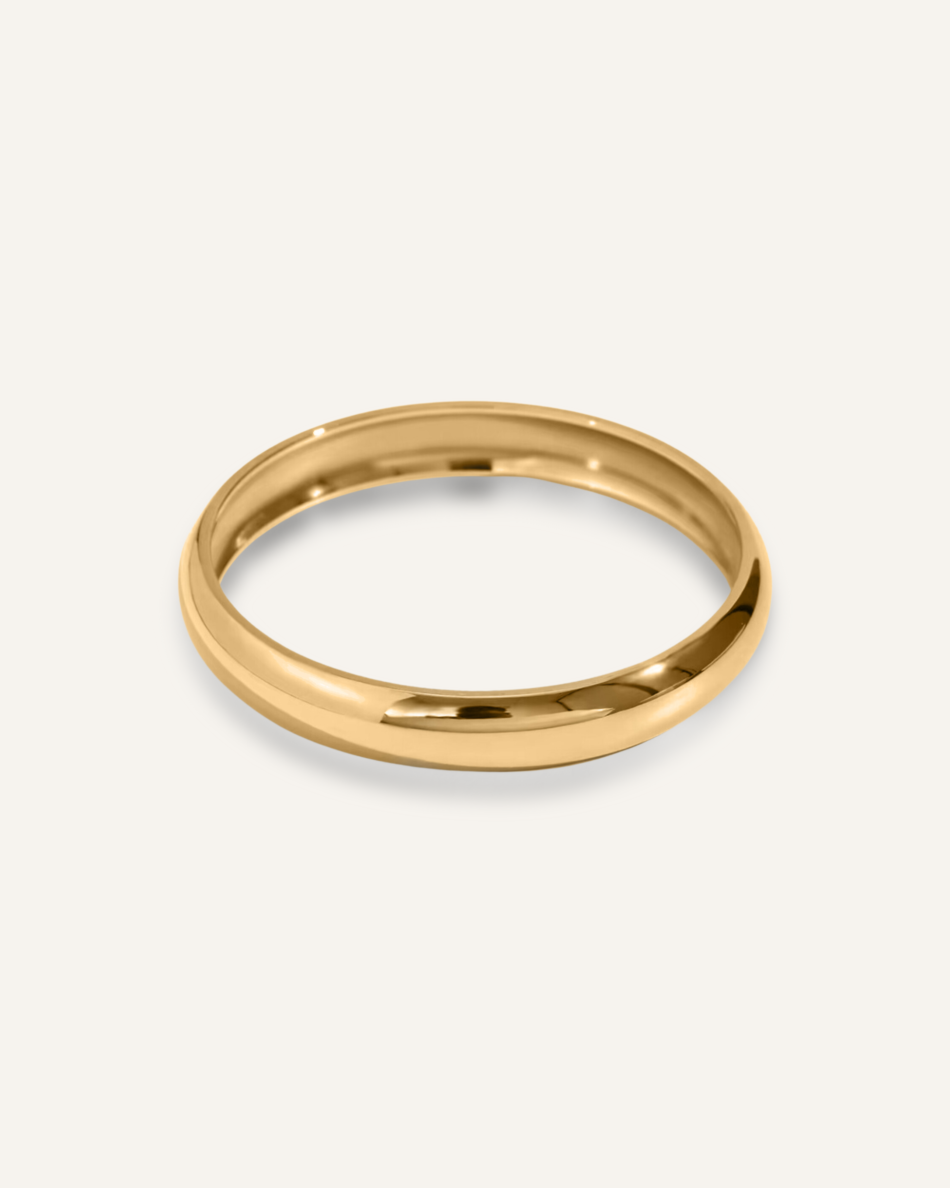 18k gold-coated Indie Cuff bangle displayed on a clean background.