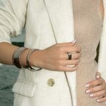 Full wrist view of the silver Indie Cuff styled with casual wear.