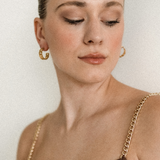 Front view of Kalani Earrings styled for a bold and modern daily look.