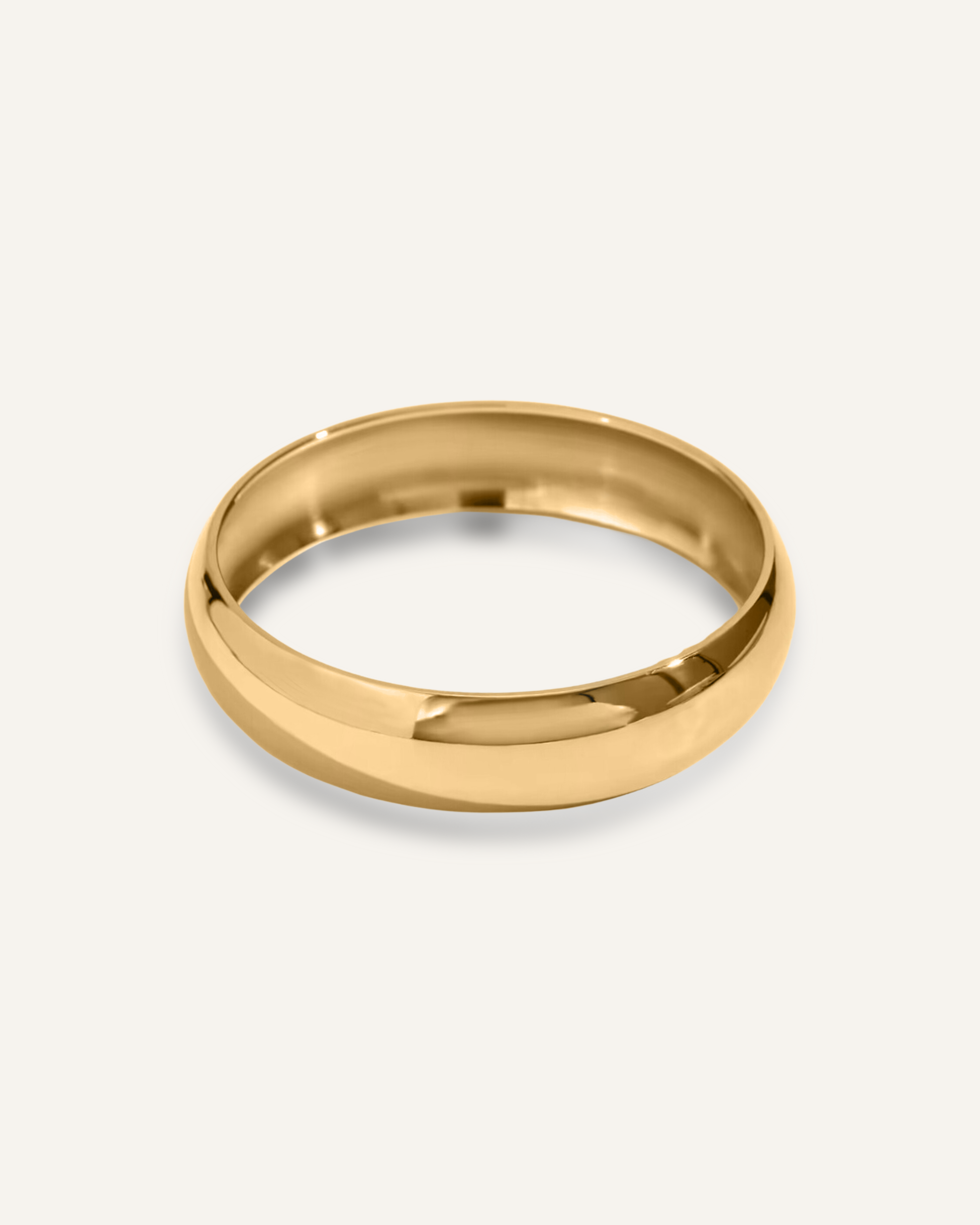 18k gold-coated Kali Cuff displayed elegantly on a white background.
