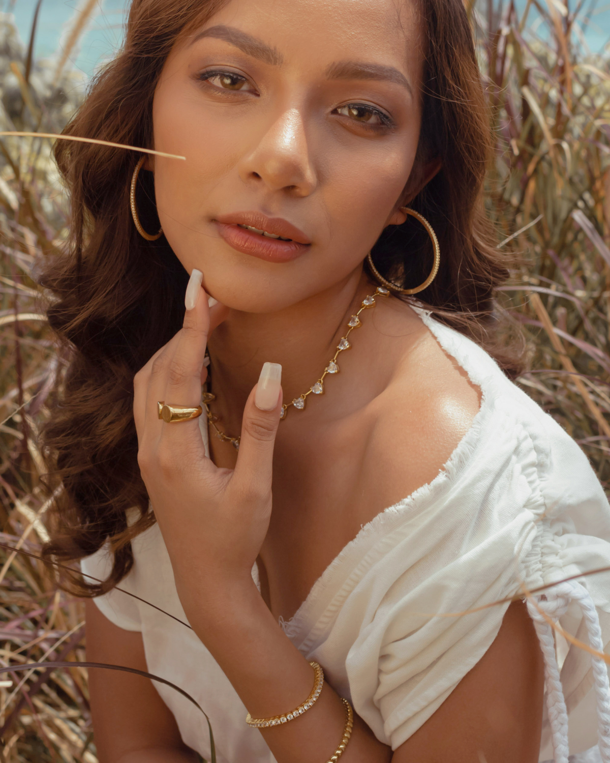 Lana Earrings paired with a minimal outfit for effortless sophistication.