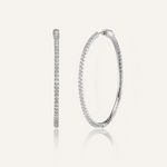 Lana silver hoop earrings with zirconia detail and huggie closure.