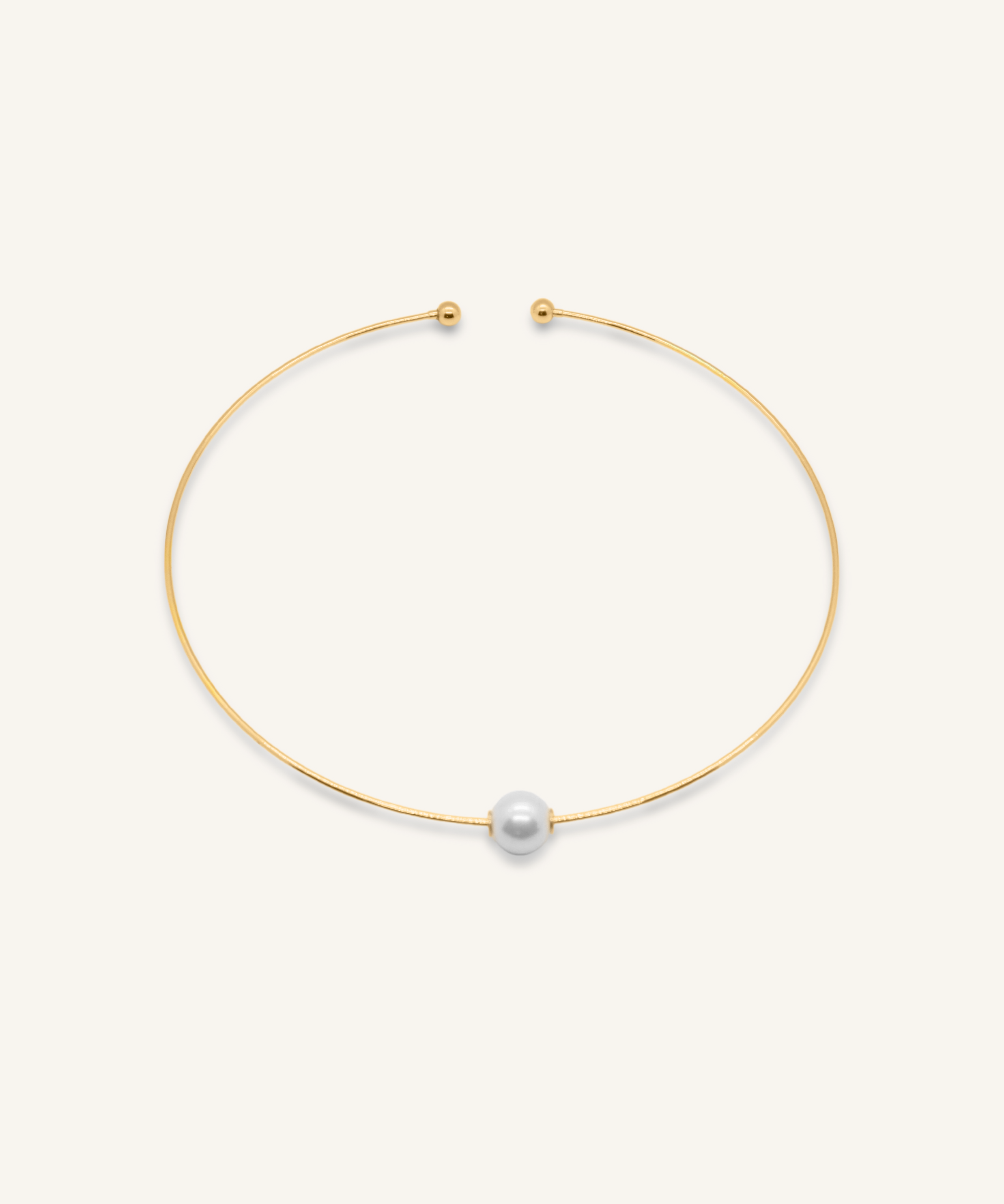 Loreli Choker in 18k gold with central pearl, minimalist paperclip chain design.