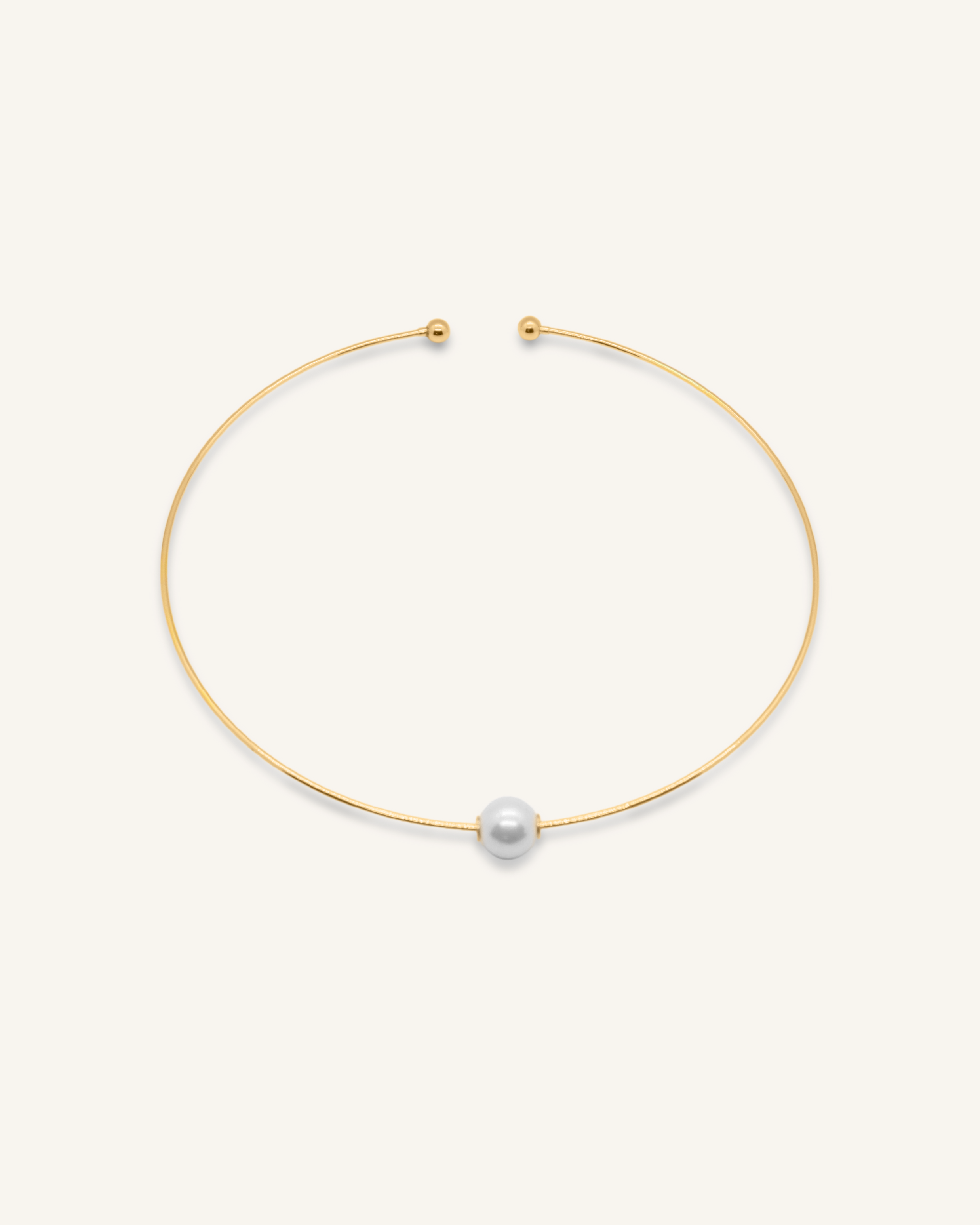 Loreli Choker in 18k gold with central pearl, minimalist paperclip chain design.