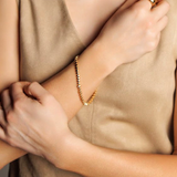 The Love Bracelet for a chic wrist look.